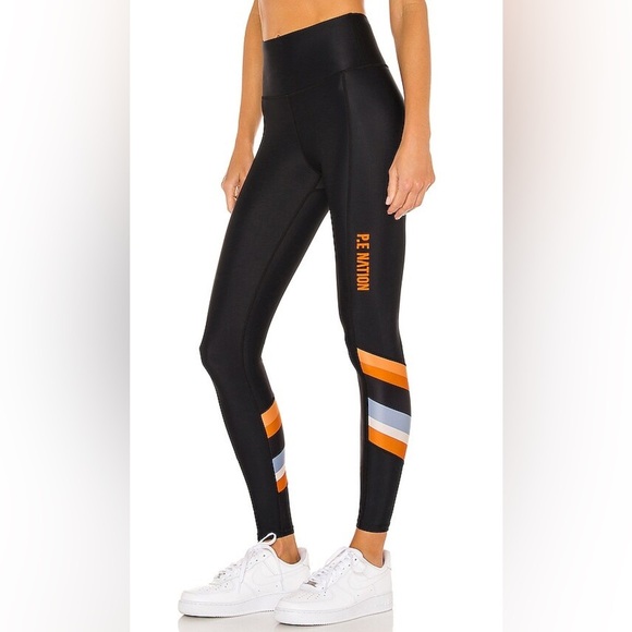 P.E Nation Score Runner High Rise Legging in Black - Picture 1 of 8
